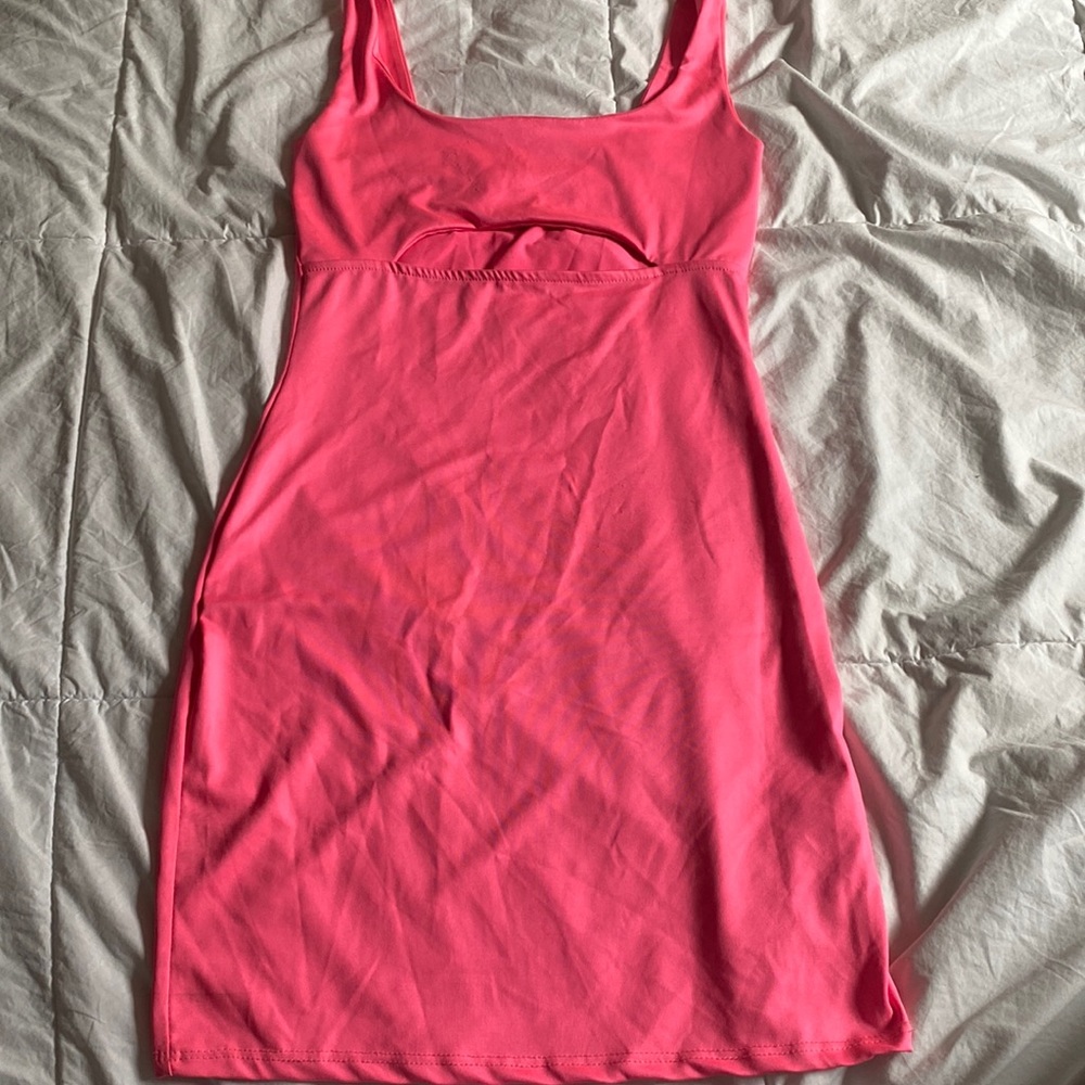 Neon pink mini dress. Front cut out. Brand: Forever 21. Size: small.